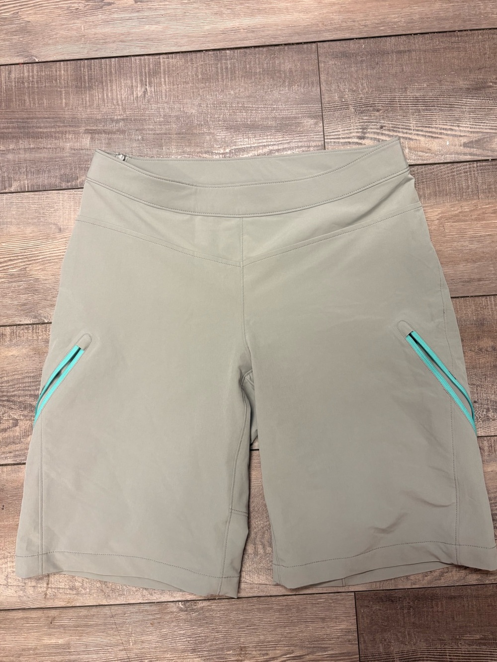 MEC Women’s Sage Green Active Shorts with Aqua Zipper Accents